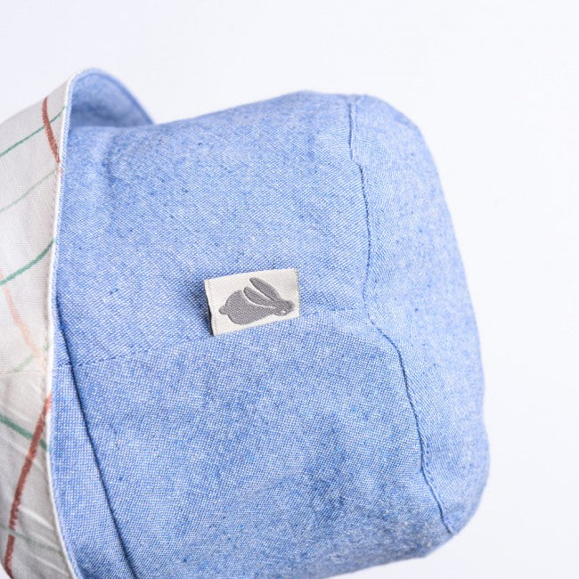 Moulinroty zonnehoedje chambray blauw +6 mnd