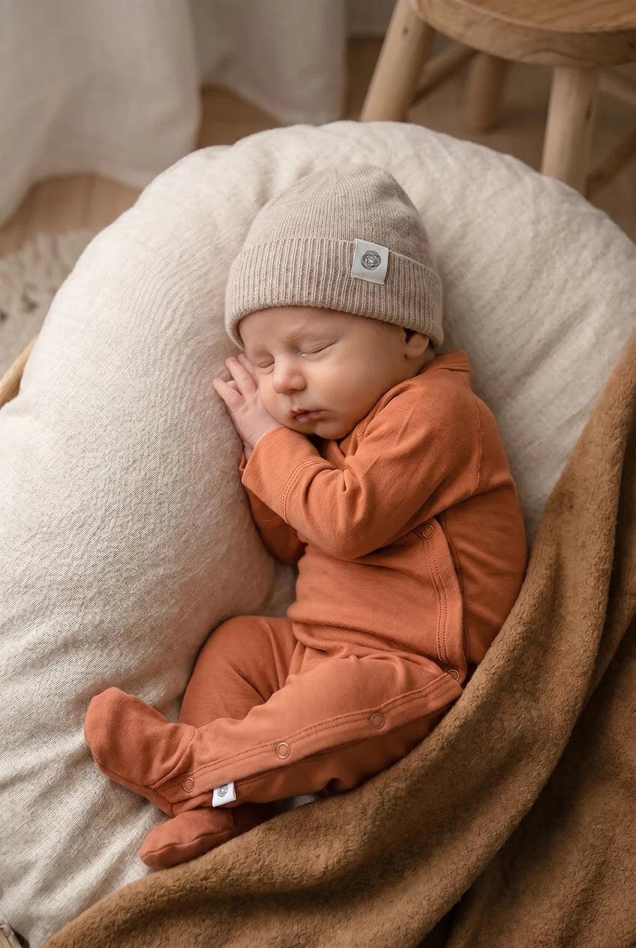 Lille Barn Baby pakje met voetjes Merinowol Coral Gold 56 cm
